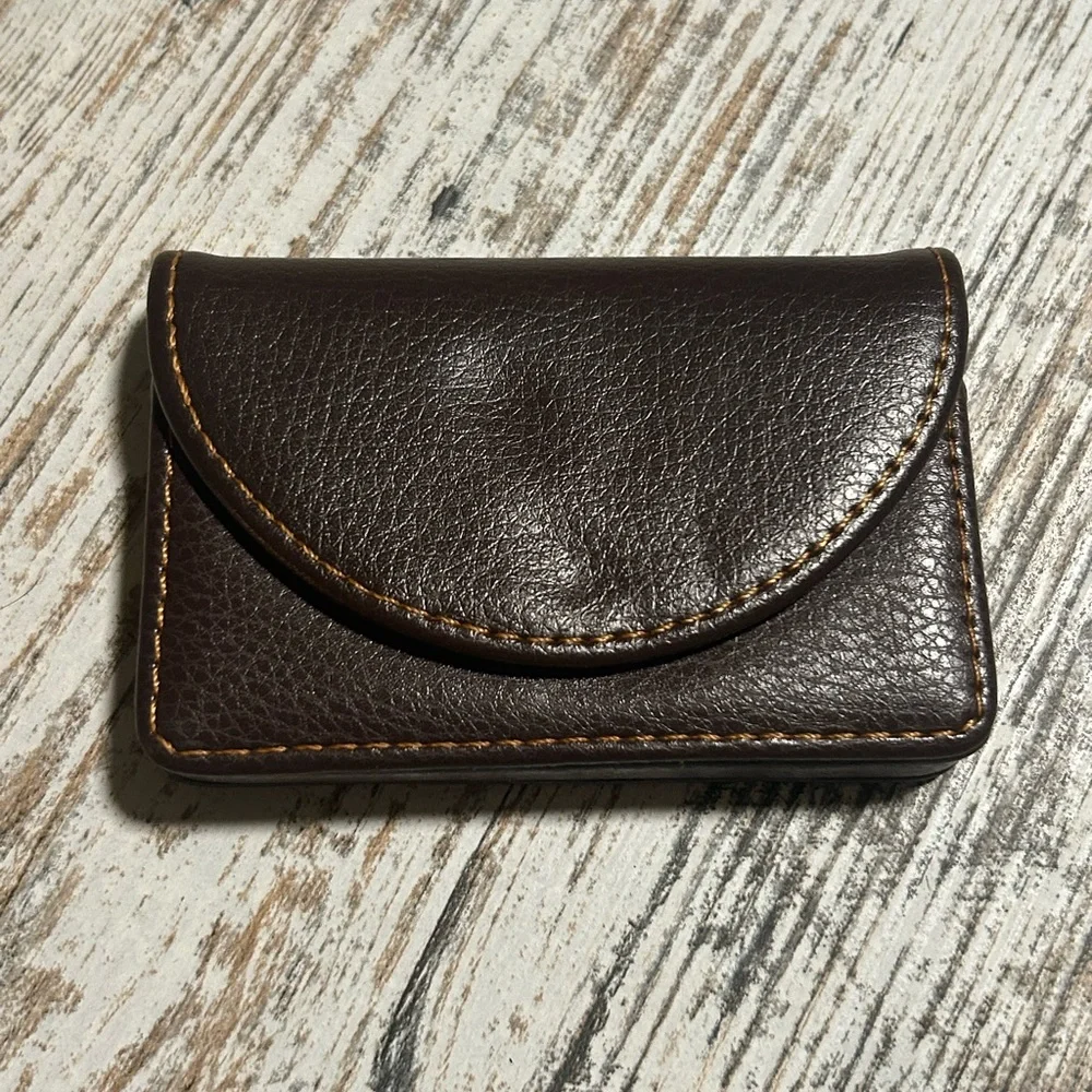 Brown Ocadux Leather Business Card Holder is a compact, pocket-sized wallet